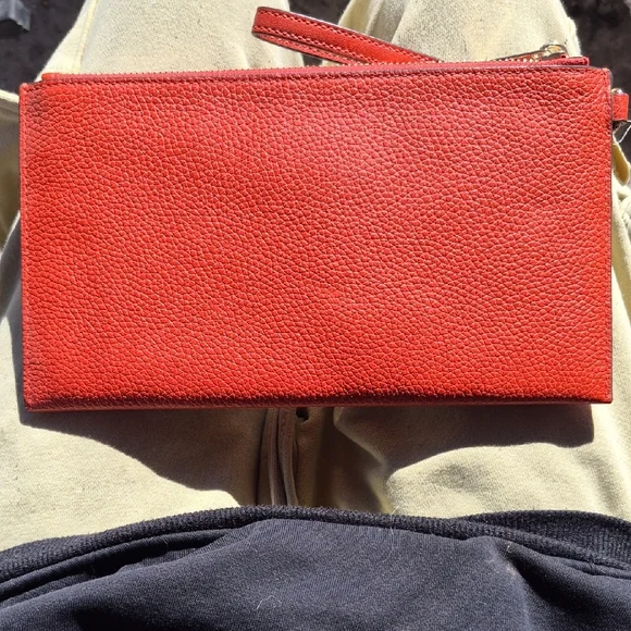 Michael Kors Orange Clutch with Gold Studs